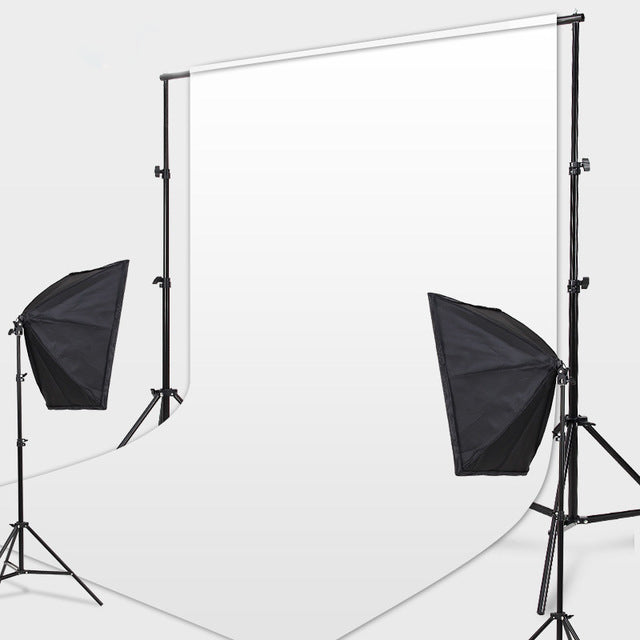 Adjustable photography backdrop stand set up in a studio