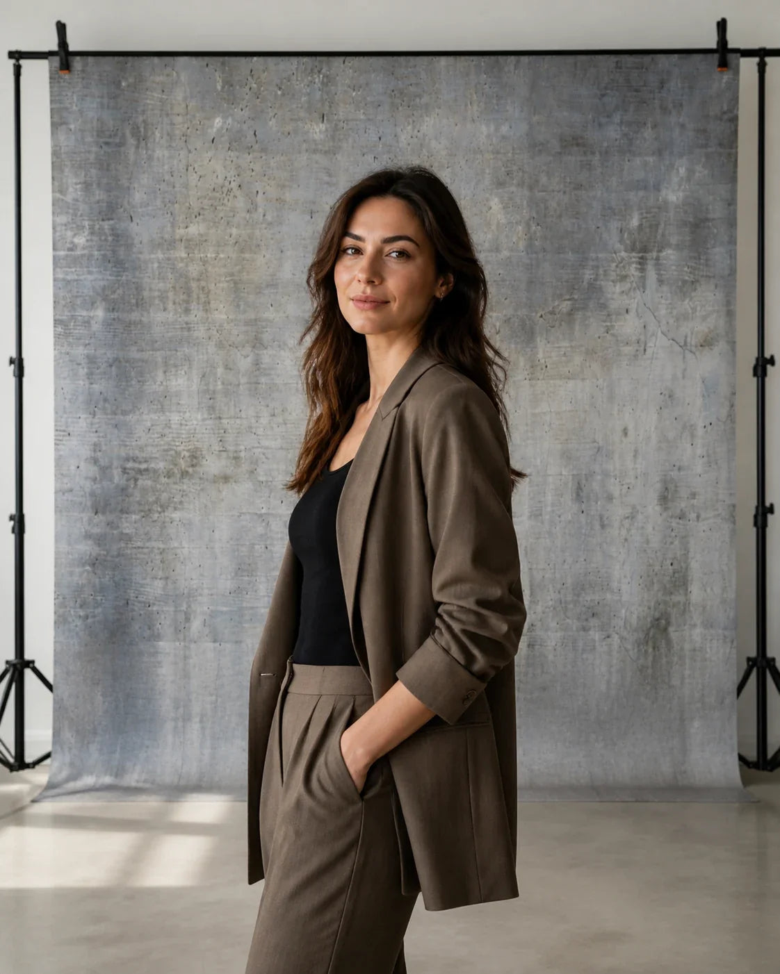 Styled portrait setup with grey textured wall photography backdrop