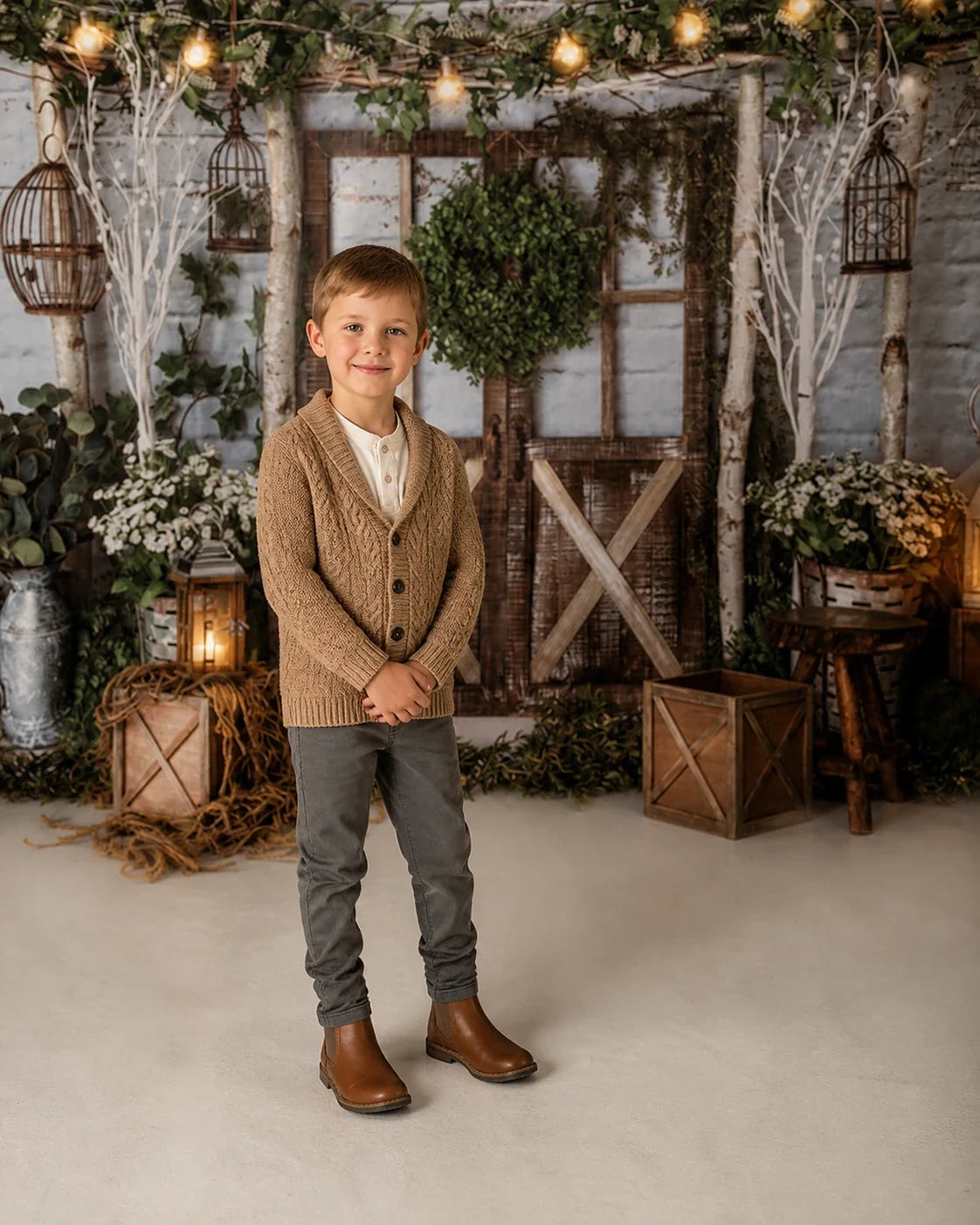 Styled child holiday portrait with Rustic Barn Door Christmas Greenery photography backdrop